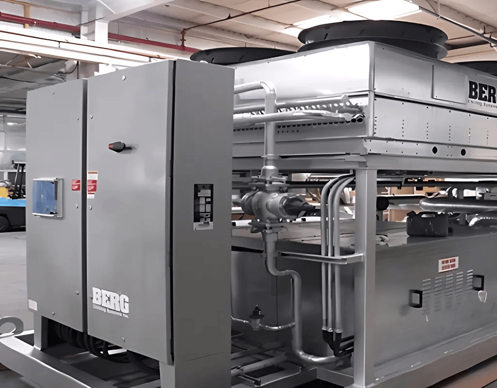 Indoor commercial HVAC rooftop unit and control panel installed inside a Southern New England warehouse.