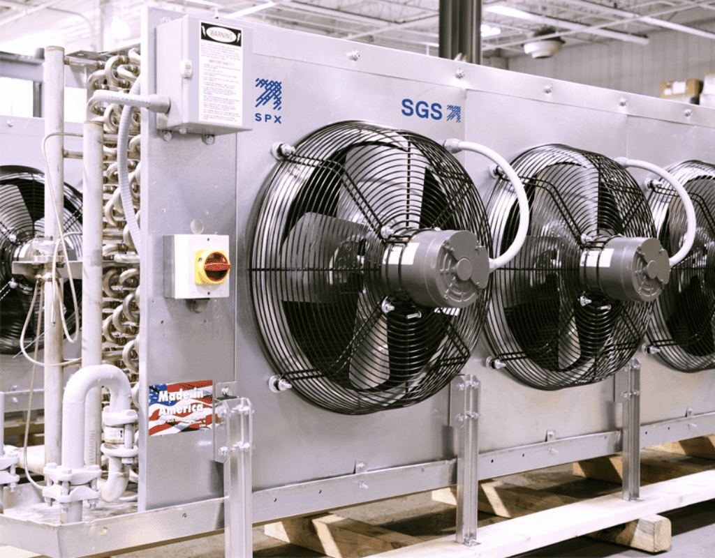 Heavy-duty commercial and industrial HVAC rooftop units operating inside a Southern New England warehouse.