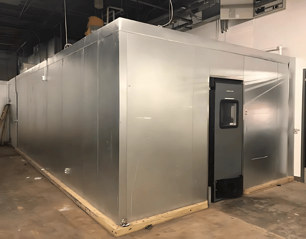 Interior view of installed insulated metal panel walk-in cooler box in a Southern New England commercial kitchen.